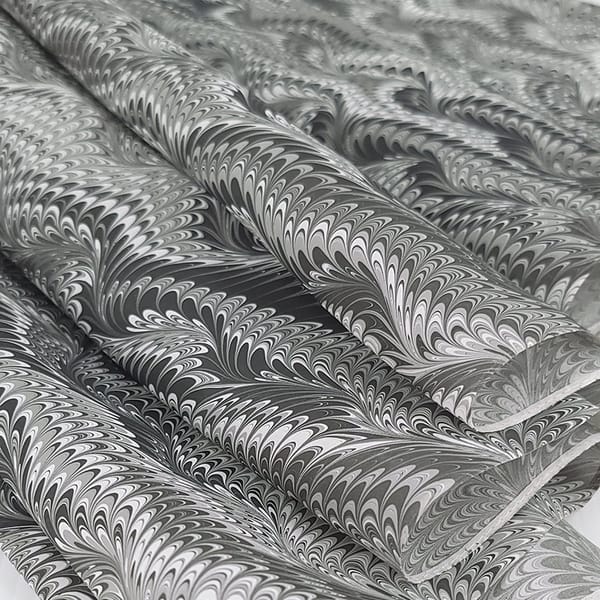 Icarus pattern hand marbled silk scarf in charcoal black and white
