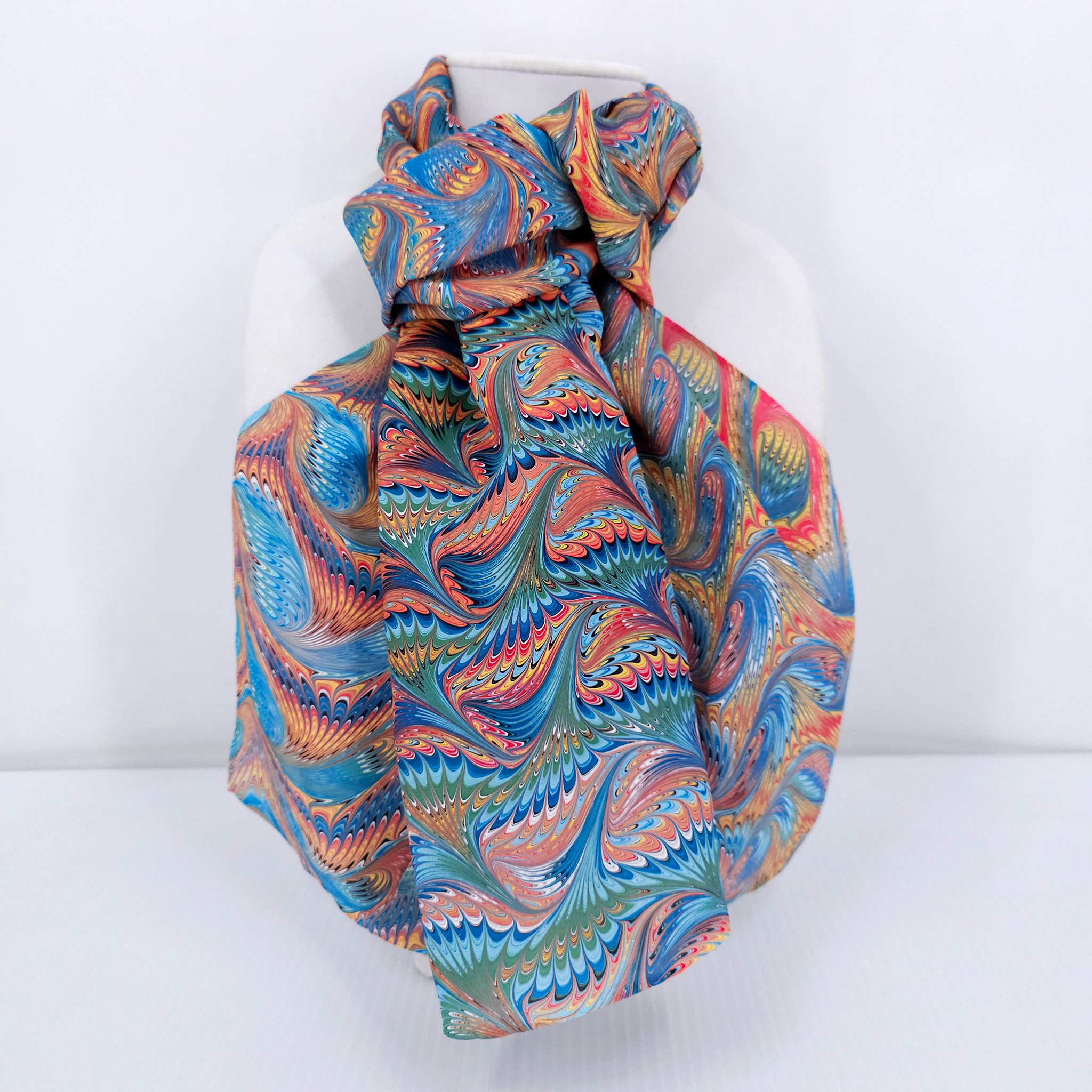 hand marbled silk scarf angel wing pattern in light blue and orange