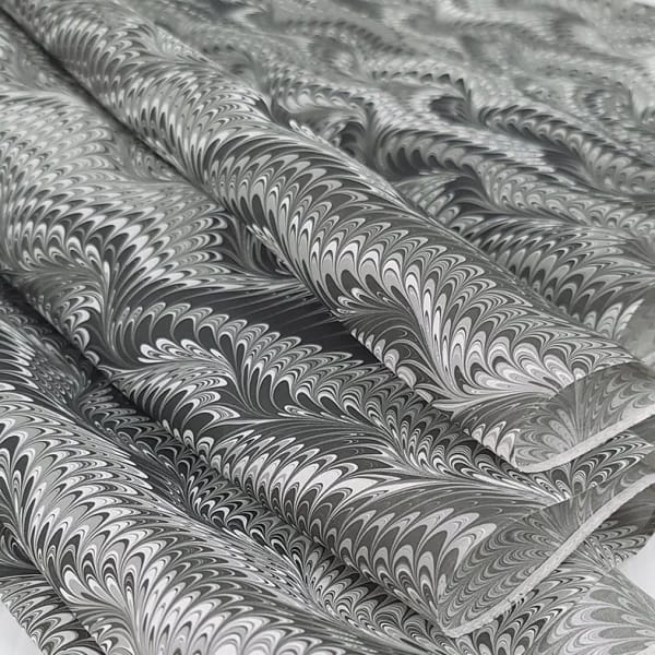 Icarus pattern hand marbled silk scarf in charcoal black and white