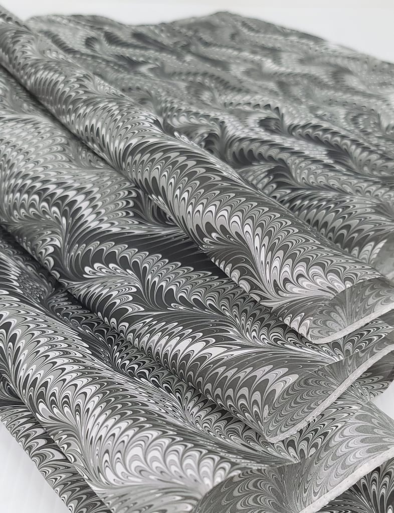Icarus pattern hand marbled silk scarf in charcoal black and white